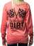 Back view of a woman wearing a pink long-sleeve shirt that says “For the love of DIRT” on the back